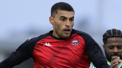 Christian Oxlade-Chamberlain in action for Truro City