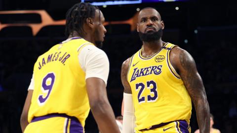 LeBron James and his son Bronny in action for the Los Angeles Lakers against the Minnesota Timberwolves