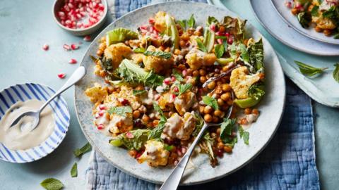 Air fryer cauliflower and chickpeas with tahini dressing.