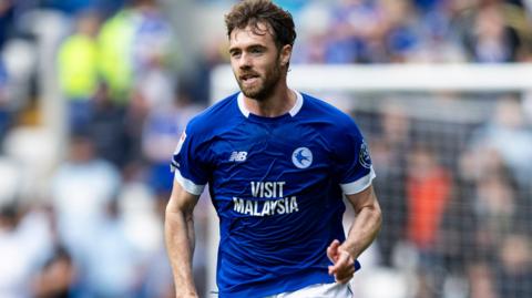 Cardiff City defender Calum Chambers running