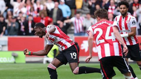Dango Ouattara celebrates scoring for Brentford against Crystal Palace.