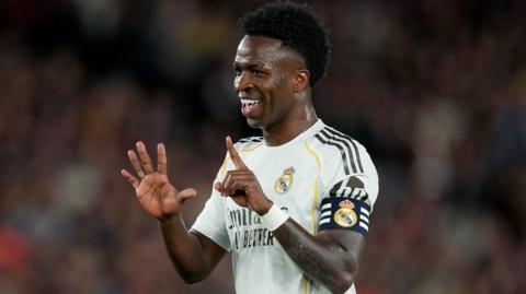 Real Madrid player Vinicius Jr celebrates