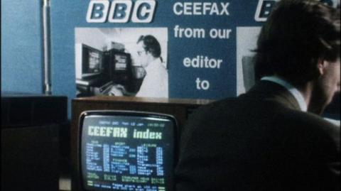 A Ceefax stand with a television showing the Ceefax index.