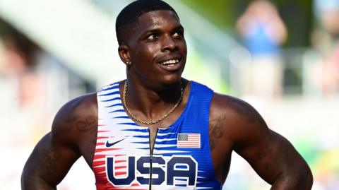 Marvin Bracy-Williams wearing a USA running vest