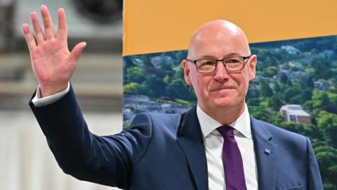 John Swinney reacts after winning his seat at the Dewars Centre in Perth