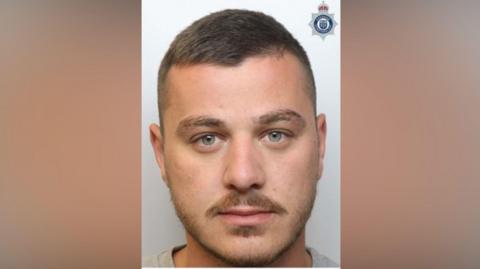 Police custody images of Endrit Nikolli (left) with brown hair wearing a grey t-shirt and facial hair