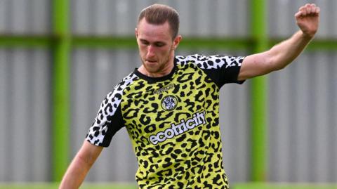 Adam May in action for Forest Green Rovers.