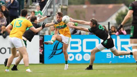 Eoin O'Neill is blocked down in the 2023 final