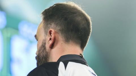 A wasp on Ross Smith's neck