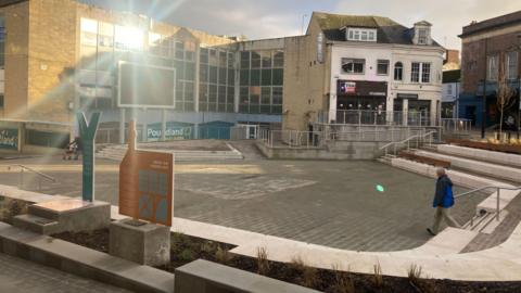 Wide shot of the new amphitheatre in Yeovil town centre with Poundland in the background  