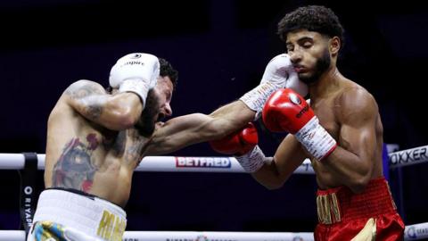 Jake Pollard punches Yuvraj Karia in the face