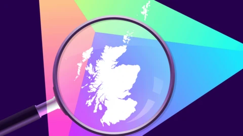 A graphic showing a map of the UK inside a magnifying glass