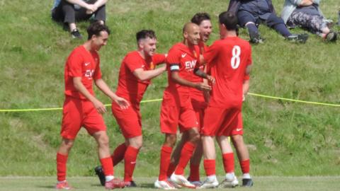 Jersey celebrate a goal