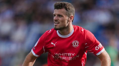 Josh March in action for Crewe