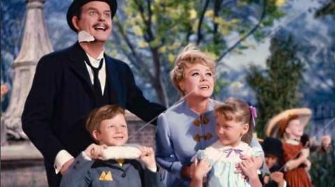 Glynis Johns as Winifred Banks in a scene from the film Mary Poppins, with George Banks and the Banks children, Michael and Jane