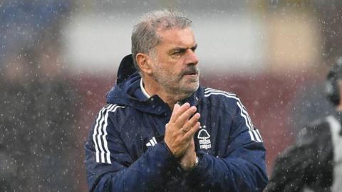 Ange Postecoglou applauds his team's supporters