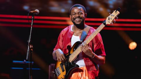 A bass player performing at the Proms.