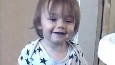 A smiling toddler