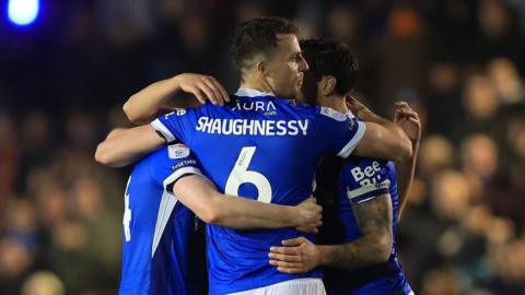 Portsmouth defenders celebrate their clean sheet against Ipswich