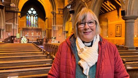 Reverend Laura Jackson stood inside St John the Baptist church.