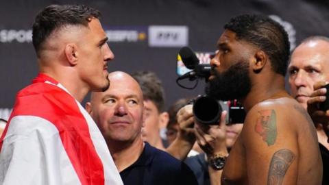 Tom Aspinall faces off with Curtis Blaydes at a weigh-in