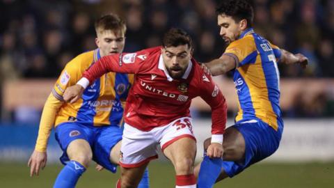 Elliot Lee in action for Wrexham against Shrewsbury