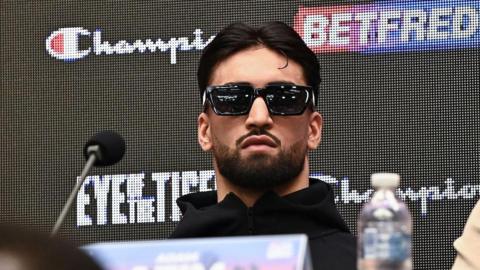 Adam Azim wearing sunglasses