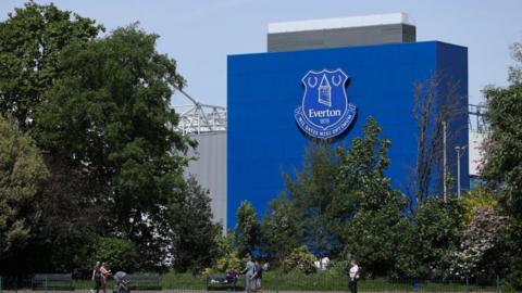 An image of the Everton badge on Goodison Park