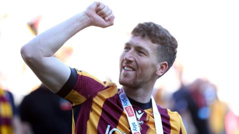 Richard Smallwood celebrates Bradford winning promotion from League Two