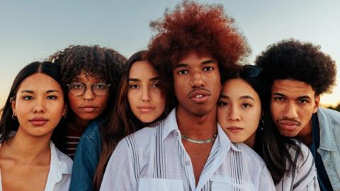 A group of friends from different ethnic backgrounds (stock photo)