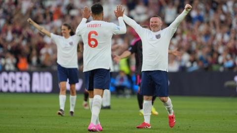England's Wayne Rooney and Joleon Lescott celebrate at the final whistle.