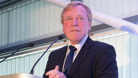 Hugh Morris gives a speech