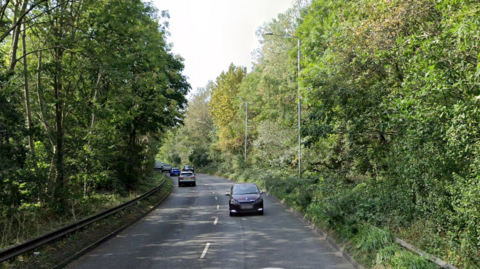 A shot a leafy section of the A6188 Tiviot Way in Stockport