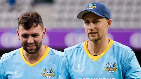 Yorkshire players including Joe Root walk off after their innings