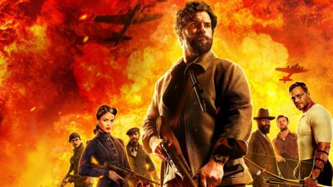 This image is a dramatic, highly stylised action film poster set against a backdrop of intense explosions and fire.