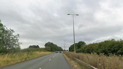 Dual carriageway with trees either side