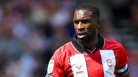 Tendayi Darikwa in action for Lincoln