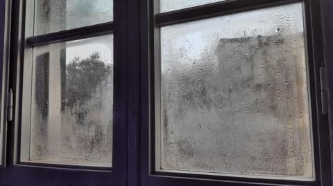 window panes which are obscured by lots of condensation