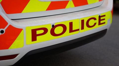 The back of a police car.