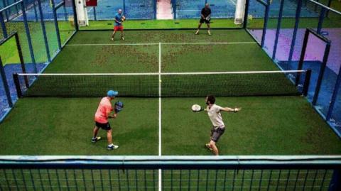 An impression showing how padel courts planned at the Dunnington Sports and Social Club could look
