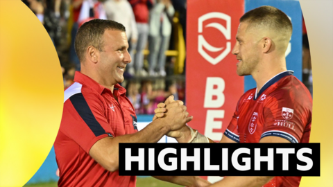 Hull KR coach Willie Peters celebrates with Ryan Hampshire after victory over Castleford