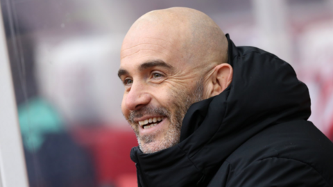 Enzo Maresca seen wearing black jacket.