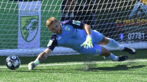 Josh Addison saves a penalty 