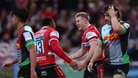 Gloucester's Ben Redshaw celebrates scoring his team's first try with teammate Will Joseph during the Gallagher PREM match between Gloucester Rugby and Harlequins at Kingsholm Stadium.