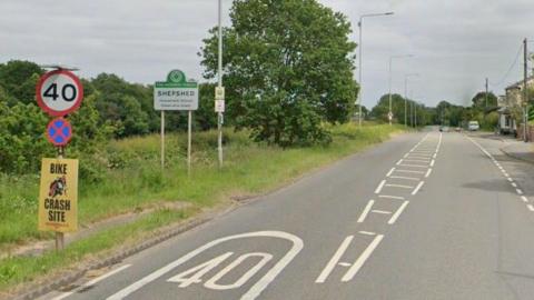Street image of the A512 with a sign that reads SHEPSHED
