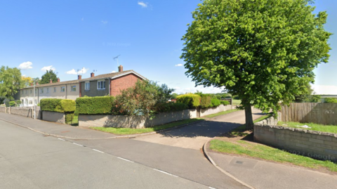 The road which leads to the playing fields