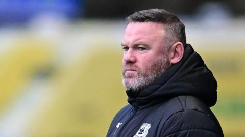 Plymouth Argyle boss Wayne Rooney on the touchline at Oxford