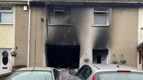 A house that has been damaged by a fire.