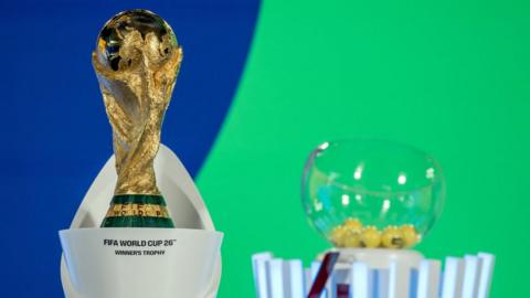 Fifa World Cup 2026 Winner's Trophy is seen on the colourful set of the draw last week