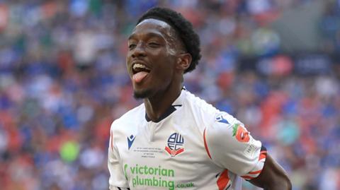 Amario Cozier-Duberry celebrates Bolton goal with tongue out